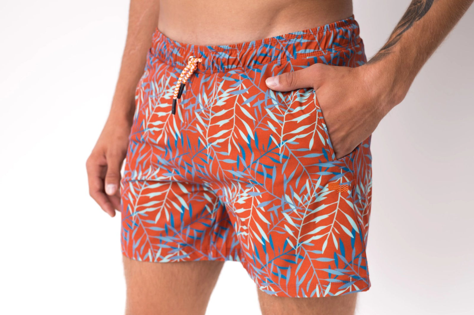 Burnt orange swim trunks top